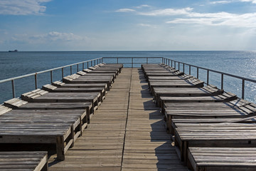 Obraz premium Empty beach terrace with sun beds.
