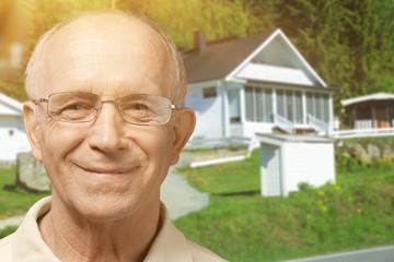 Happy senior man in glasses