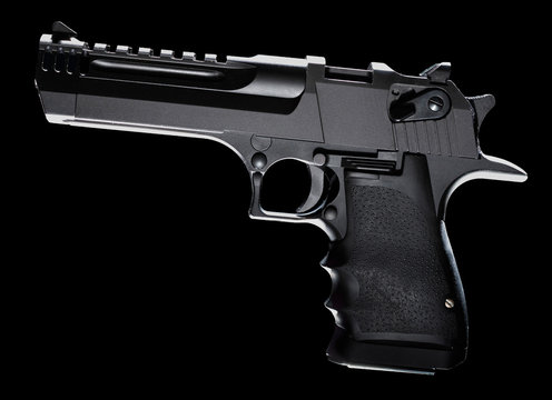 High powered pistol on black