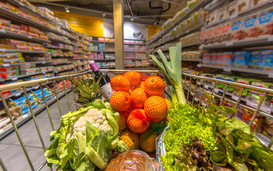 Supermarket cart with products