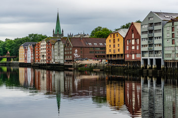 Fototapeta na wymiar TRONHEIM, NORWAY - 11 August 2017: Colorful canals of Trondheim