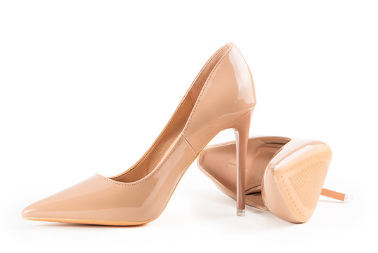 Nude high heel isolated on white background. Nude stiletto isolated on white background. With clipping path for artwork and design. Fashion shoes.
