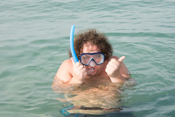 Sea and vacation. Funny fat guy. 