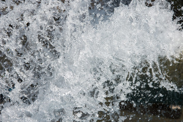 Splashing water. Summer and fountain. 