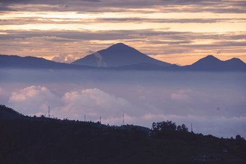 Beautiful misty mountain at dawn time