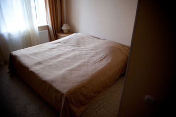Fototapeta na wymiar Simple bedroom in hotel room