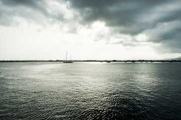 Dramatic view of the horizon on a rainy day from the tourist port of Ortigia in Syracuse.