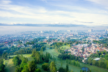 Dense houses and golf course in Bandung city