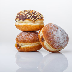 Buns with different fillings on a white background