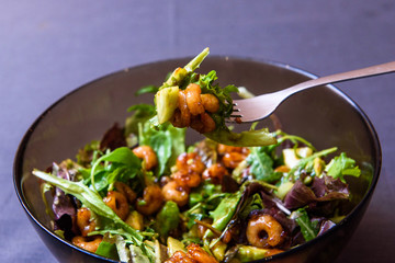 Shrimps salads with soya sauce, lettuce and avocado.