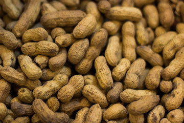 peanuts in shell natural food seems market mall background surface counter 
