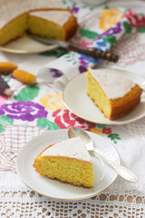Traditional Romanian or Moldovan corn pie malay, with icing on a light background. Rustic style.