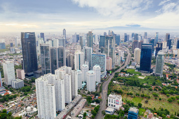 Obraz premium Jakarta skyscrapers in Sudirman at misty morning