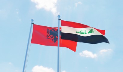 Iraq and Albania, two flags waving against blue sky. 3d image