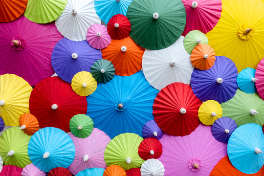 Background of collorful traditional Asian paper umbrellas