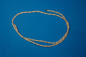 Fototapeta premium Rope breaking isolated over a blue background