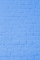 Obraz premium Pastel bright blue colored brickstone wall