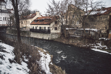 Obraz premium Winter river at Uzupis district in Vilnius, Lithuania