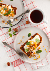 carrot fruit cake with nuts and cream