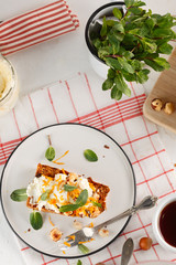 carrot fruit cake with nuts and cream