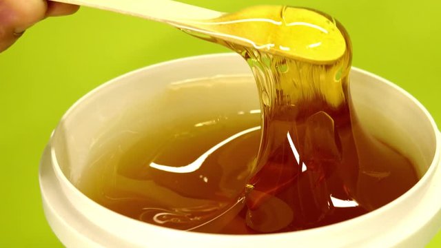 Shugar paste for hair removing put from plastic jar 