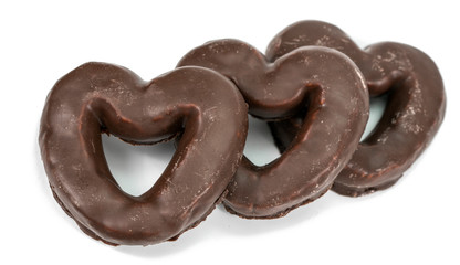 chocolate cookies in the shape of a heart on a white background