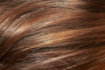 Brown hair as background, texture. One of the popular shades of hair coloring