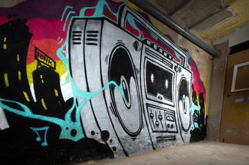 ghettoblaster graffiti on a wall