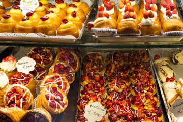 Pastries (dolci) In A Glass Counter In an Italian Pastry Shop (pasticceria) In Rome, Italy.