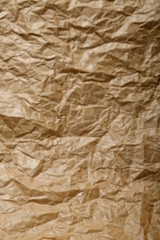 Crumpled parchment or baking paper for baking culinary and confectionery products as natural background. 