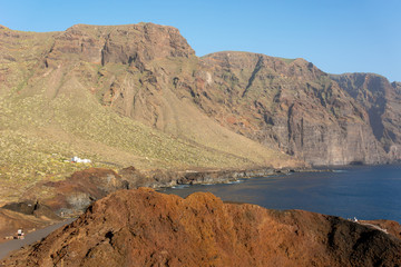 Sheer cliffs of Los Gigantes raising above Atlantic ocean.
