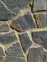 Facade of gray natural stone