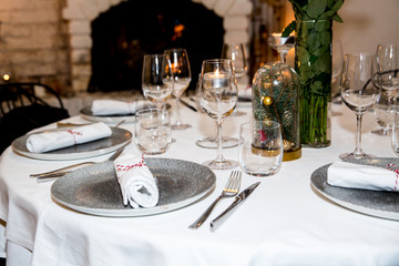 Set the table in the restaurantrestaurant, table, set, dish, setting, silverware, plate, fork, dinner, food, napkin, glass, dining, tableware, cutlery, knife, white, luxury, cafe, elegant, lunch, banq