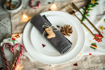 table setting for dinner at christmas