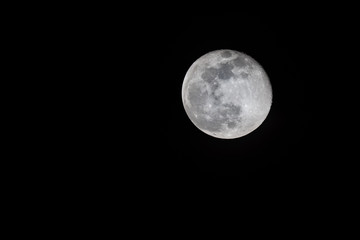 A beautiful picture of a full moon in the night