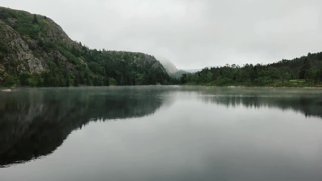 Timelapse on a misty lake