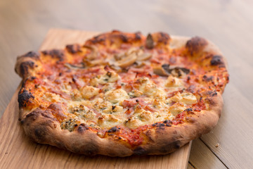 Premium pizza on a plate.​