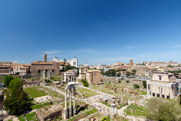 Fototapeta na wymiar Roman Forum, Rome, Italy, with a blue sky background