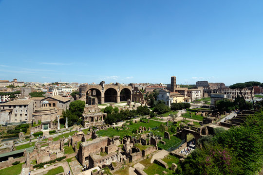 Wide angle view of the Roman Forum, with the The Basilica of Maxentius and Constantine, sometimes known as the Basilica Nova prominent in the picture 