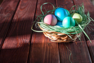 Easter eggs on wooden planks