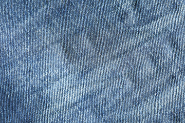 Texture of blue jeans as background, space for text