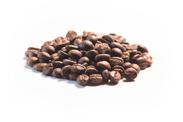 heap of coffee beans isolated on white