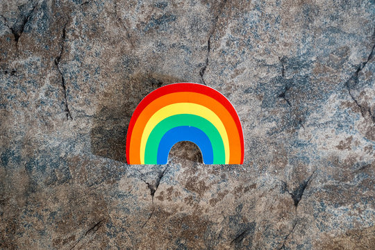 Rainbow on a marble background. Concept for gay pride month, lesiban, homosexuality and gay marriage