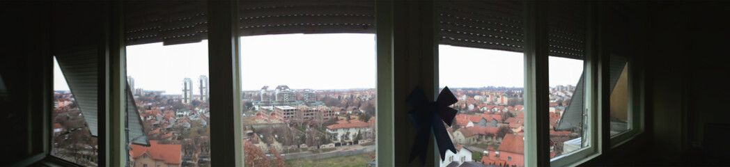 Fototapeta na wymiar Belgrade, Serbia, ZEMUN, panorama, windows on an old residential building.