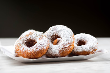 Takeaway coffee and donuts