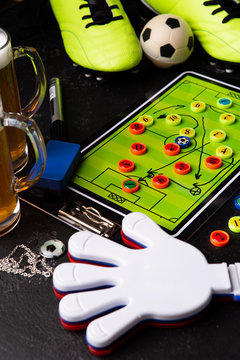 Photo of table football, soccer ball, boots, toys