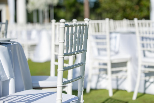 White wedding recetion withwhite chivari chairs