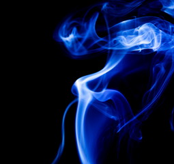 Obraz premium Blue smoke on black background