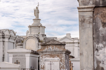 Beautiful above ground graves in the famous St. Louis Cemetery Number 1 in New Orleans, Louisiana, site of the grave of Marie Laveau, Vodoo Queen.