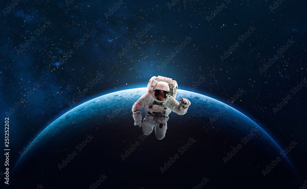 Poster astronaut on orbit of earth planet in the outer space. abstract wallpaper. spaceman. elements of thi